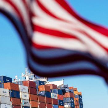A cargo ship full of shipping containers is seen at the port of Oakland, California, on August 4, 2025. 
