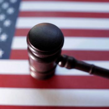 US flag and Judge gavel are seen in this photo illustration. 