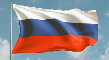 The flag of Russia flutters in the wind. IMAGO/Westlight via Reuters Connect