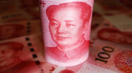 Chinese Yuan banknotes are seen in this photo illustration. 