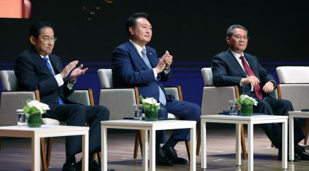 Japanese Prime Minister Fumio Kishida, South Korean President Yoon Suk Yeol, and Chinese Premier Li Qiang attend the business summit at the Korea Chamber of Commerce and Industry on May 27, 2024 in Seoul, South Korea.