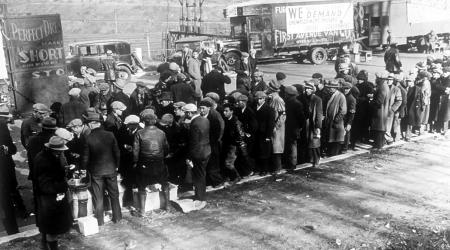 People queue in line at a soup kitchen during the Great Depression, in Washington, 1932. 