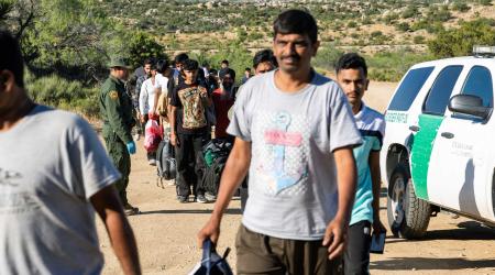 People are processed by US Border Patrol agents after crossing the US-Mexico border on June 8, 2024 in Jacumba Hot Springs, California. 