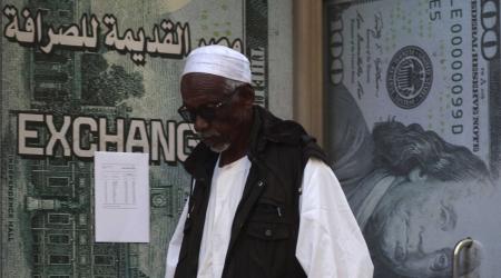 A man walks in front of a currency exchange office in Cairo, Egypt, on January 17, 2023. 