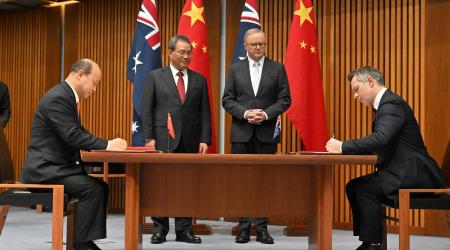 China's Ambassador to Australia Xiao Qian, China's Premier Li Qiang, Australia's Prime Minister Anthony Albanese and Minister for Education Jason Clare at a signing ceremony at Parliament House in Canberra, Australia, Monday, June 17, 2024. 