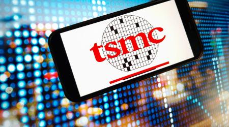 In this photo illustration, the TSMC Taiwan Semiconductor Manufacturing Company logo is seen displayed on a smartphone screen. 