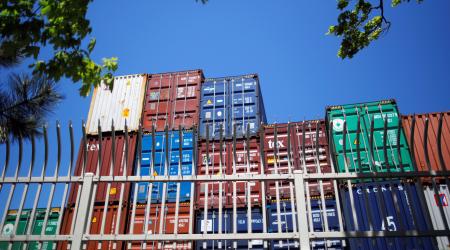 Shipping containers are stacked at a container terminal in Boston, Massachusetts, US. 