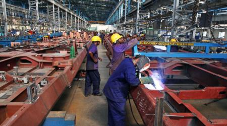 Workers on an assembly line at a factory, in Chennai, India. Picture taken May 26, 2023. 