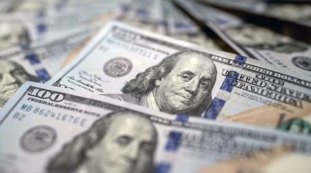 US one hundred dollar bills are shown in this picture illustration. 
