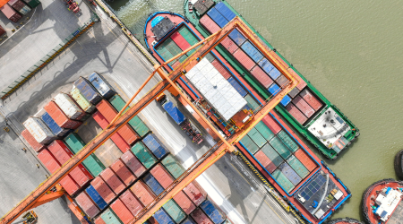 Aerial photo shows cargo ships loading and unloading containers. Picture taken April 12, 2023. 