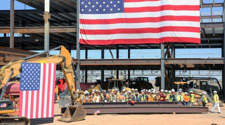 Workers wait to greet President Joe Biden at Intel's Ocotillo Campus in Chandler, Arizona. Picture taken on March 20, 2024. 