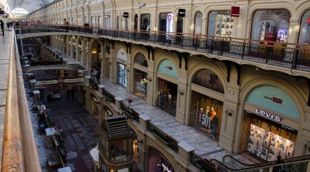 Store brands and logos are seen in a shopping mall in Moscow, where many foreign brands have been suspending business in recent years. Photo taken on March 10, 2022. 