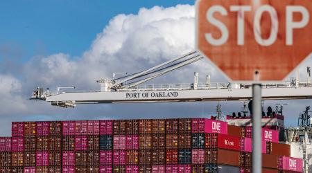 A cargo ship full of shipping containers is seen at the port of Oakland as trade tensions escalate over US tariffs, in Oakland, California, US. Picture taken on March 6, 2025. 
