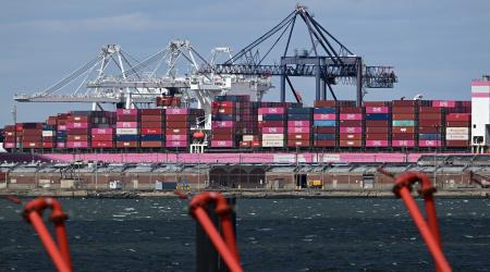 Cargo ship and shipping containers seen at the Port Jersey Container Terminal, New York, NY. 