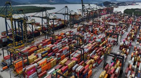 A drone view shows ships and containers at a port in South America. Picture taken on April 3, 2025. 