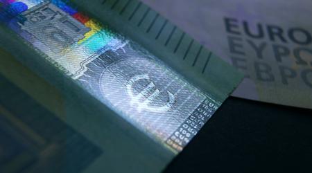  Two 100 Euro banknotes are shown in this photo illustration. 