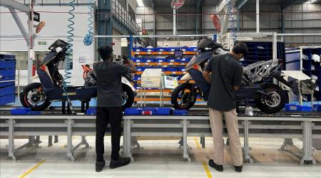 Workers assemble Ather 450X electric scooter inside Ather Energy's manufacturing facility in Hosur in southern state of Tamil Nadu, India, March 23, 2025.