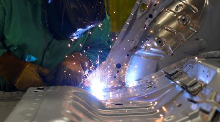 Line workers weld parts at a manufacturing plant in Smyrna, Tennessee. 