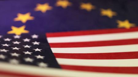 US and EU flags are seen in this photo illustration taken April 10, 2025. 