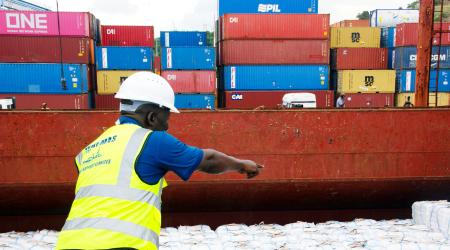 A worker unloads shipments in Africa. Picture taken on July 11, 2025. 