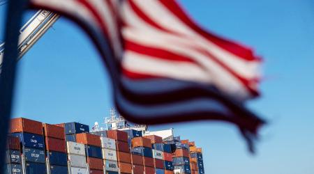 A cargo ship full of shipping containers is seen at the port of Oakland, California, on August 4, 2025. 