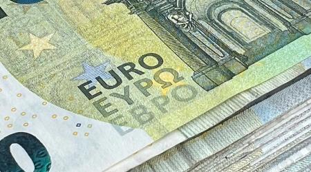 Euro banknotes are shown in this photo illustration. 