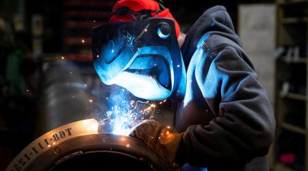A worker welds a steel tube at a factory in Mendota, Illinois. Picture taken on February 21, 2025. 