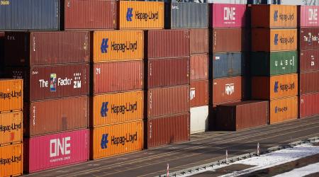 Stacks of containers are pictured at a port. 
