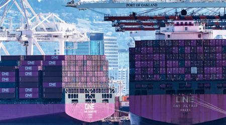 Cargo ships full of shipping containers are seen at the port of Oakland, as trade tensions escalate over US tariffs. Picture taken in Oakland, California on March 6, 2025. 