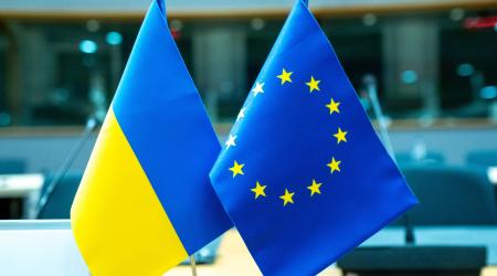 The flags of Ukraine and the EU are displayed during a meeting in Brussels. Picture taken April 9, 2025. 