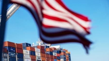A cargo ship full of shipping containers is seen at the port of Oakland, California, on August 4, 2025. 