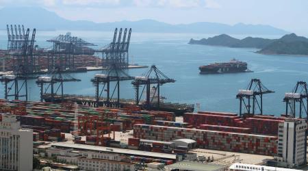 A cargo ship carrying containers is seen near the Yantian port in Shenzhen, China. 