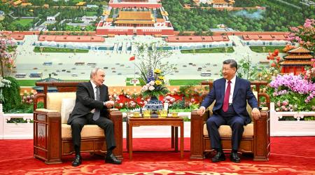 •	Russian President Vladimir Putin and Chinese President Xi Jinping have tea following their meeting at the Great Hall of the People in Beijing, China May 20, 2026. 