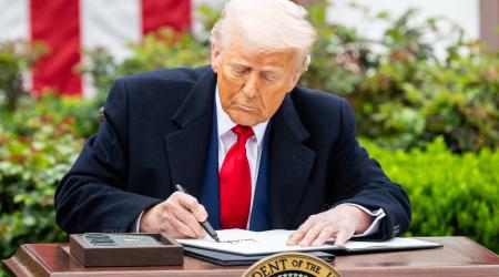 President Donald Trump signing an executive order at a "Liberation Day" event where the president signed an executive order creating reciprocal tariffs, in the Rose Garden at the White House in Washington, D.C.