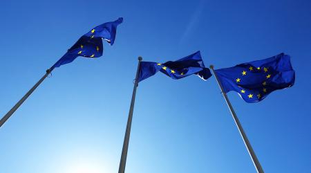 EU flags flutter outside the EU Commission headquarters in Brussels, Belgium. March 2025. 