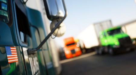 Trucks queue up at the US-Mexico border as the two governments are set to begin a bilateral review of the USMCA trade agreement that will also include Canada. March 12, 2026. 