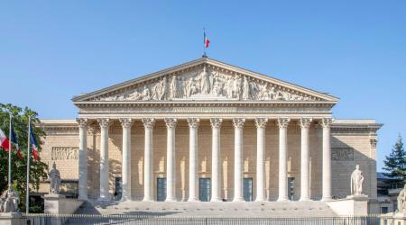 Façade-National-Assembly-France: Exterior facade of the Palais Bourbon in Paris, France where the French National Assembly meets. July 2024. 