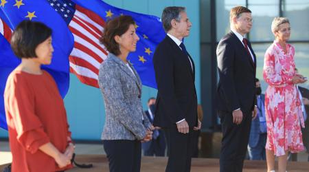 U.S. Secretary of State Antony Blinken, Commerce Secretary Gina Raimondo and Trade Representative Katherine Tai stand near European Commission Executive Vice President Margrethe Vestager and EU Executive Vice President Valdis Dombrovskis as they participa