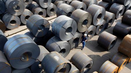  A worker checks coils of steel at Turkish steel manufacturer company in Hatay province May 6, 2010. 