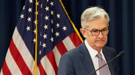 U.S. Federal Reserve Chairman Jerome Powell arrives to speak to reporters after the Federal Reserve cut interest rates in an emergency move designed to shield the world's largest economy from the impact of the coronavirus, in Washington, U.S.