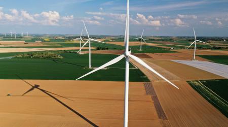 An aerial view shows power-generating windmill turbines in a wind farm in Graincourt-les-Havrincourt, France, April 27, 2020. Picture taken with a drone REUTERS/Pascal Rossignol/File Photo