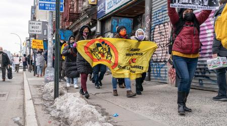 Activists march for laundry workers fired by Wash Supply Laundromat company for organizing union on Allen street in New York on March 6, 2021. 