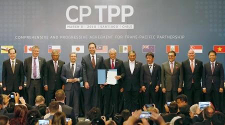 Representatives of members of Trans-Pacific Partnership (TPP) trade deal pose for an official picture after the signing agreement ceremony in Santiago, Chile, March 8, 2018. 
