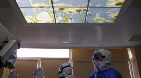 Medical workers wearing personal protective equipment (PPE) work in the Intensive Care Unit (ICU), ECMO Centre of the City Clinical Hospital Number 52, where patients suffering from the coronavirus disease (COVID-19) are treated, in Moscow, Russia 