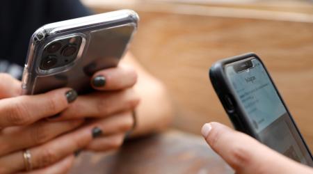 People use their cellphones in Manhattan, New York City, U.S., September 17, 2020