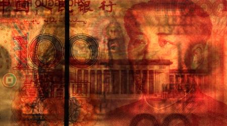 A U.S. $100 banknote is placed on a 100 yuan banknote in this photo illustration taken in Beijing October 17, 2010.