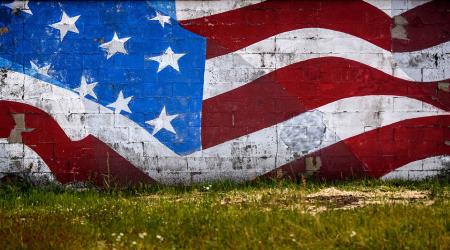 A mural of the United States flag covers the side of a business, in Lansing, Michigan. Photographed on Friday, June 26, 2020. USA TODAY NETWORK via Reuters Connect/Nick King