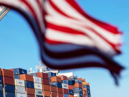 A cargo ship full of shipping containers is seen at the port of Oakland, California, on August 4, 2025. 