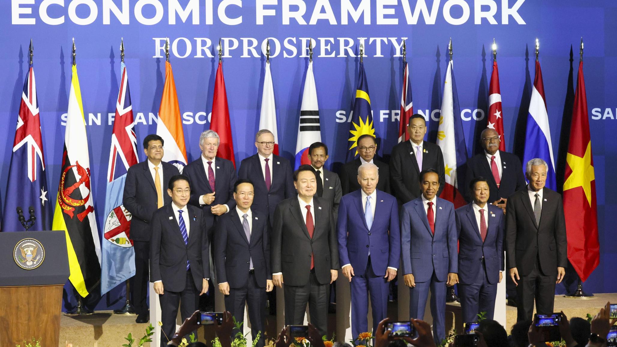 Participants of a summit on the economic initiative called the Indo-Pacific Economic Framework attend a photo session on Nov. 16, 2023, in San Francisco. 