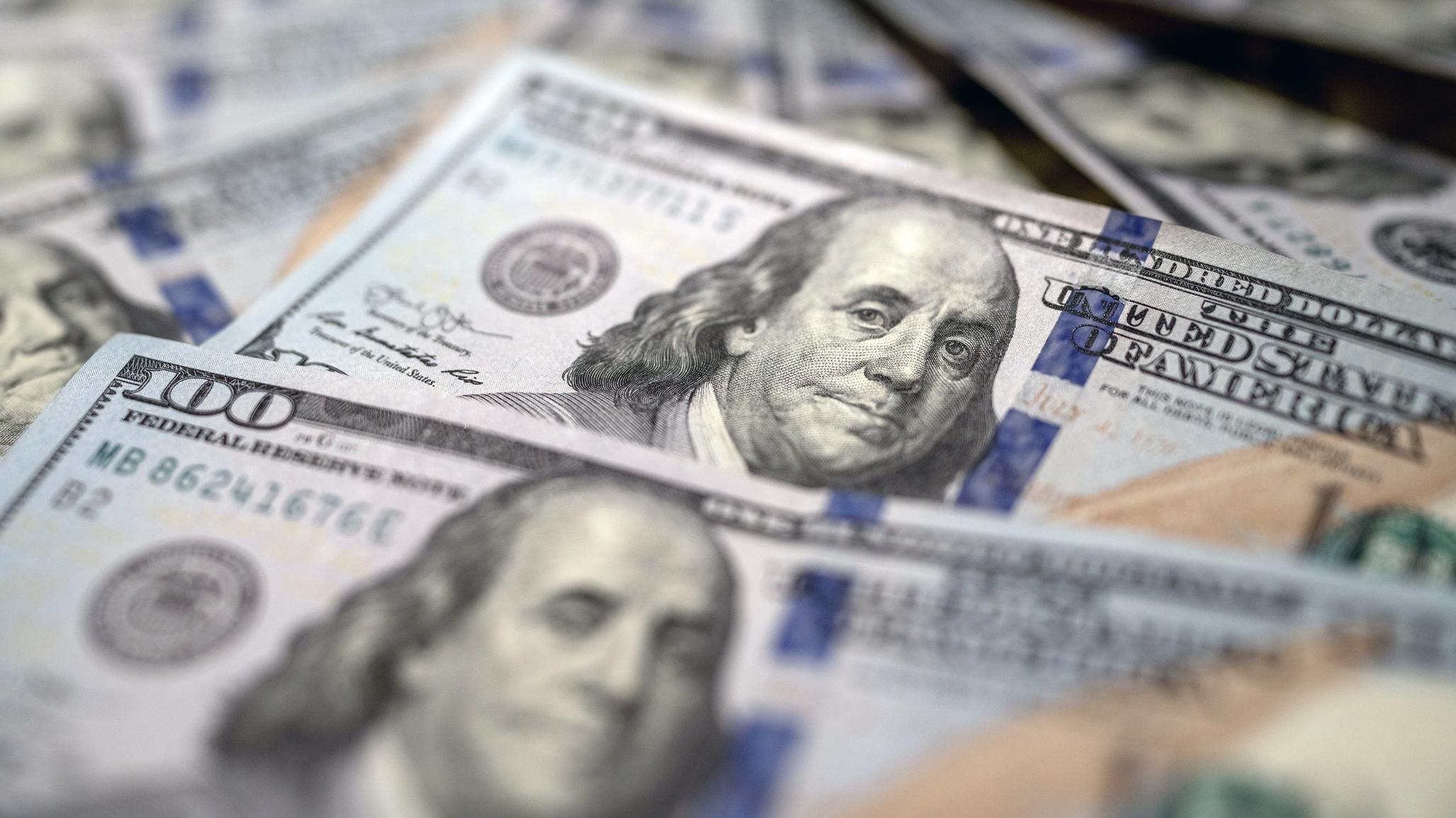 Photo illustration of US currency. `